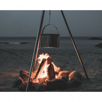 Robust stainless steel pot designed for hanging over an open fire.