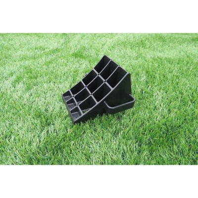 Nivåklossen har en stoppkil med handtag.